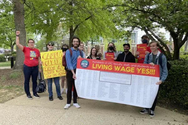 UCW members holding living wage petition