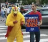 Picture of Cameron Brooks with Sign "UT Workers Need a Raise"
