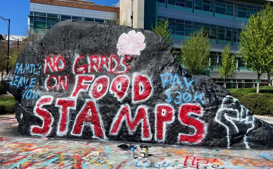 no grads on food stamps painted on the rock at utk